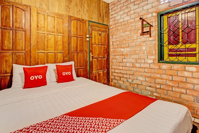 Imagen de la habitación del Hotel OYO Homes 93598 Omah Baturan Syariah. Foto 8