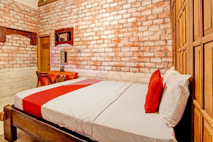 Imagen de la habitación del Hotel OYO Homes 93598 Omah Baturan Syariah. Foto 10