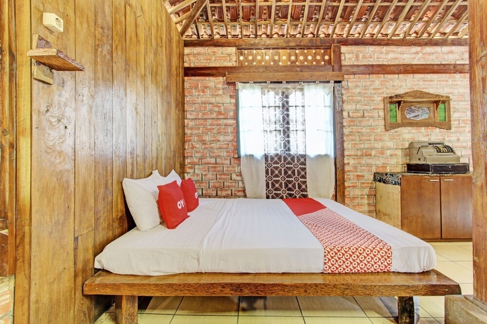 Imagen de la habitación del Hotel OYO Homes 93598 Omah Baturan Syariah. Foto 12