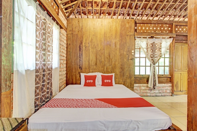 Imagen de la habitación del Hotel OYO Homes 93598 Omah Baturan Syariah. Foto 13
