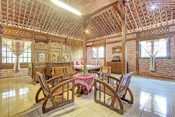 Imagen de la habitación del Hotel OYO Homes 93598 Omah Baturan Syariah. Foto 14