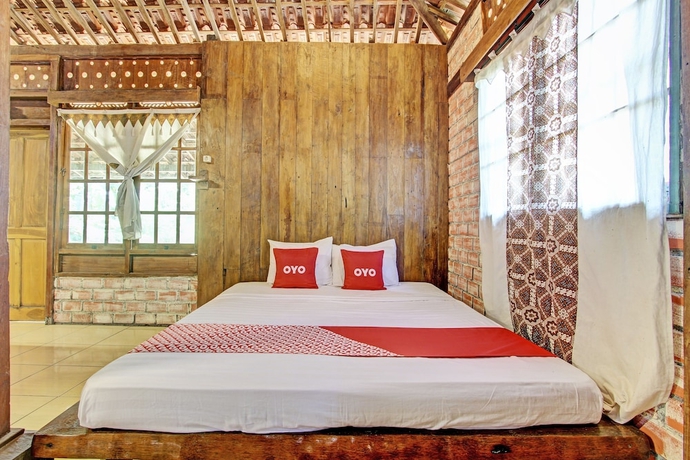 Imagen de la habitación del Hotel OYO Homes 93598 Omah Baturan Syariah. Foto 15
