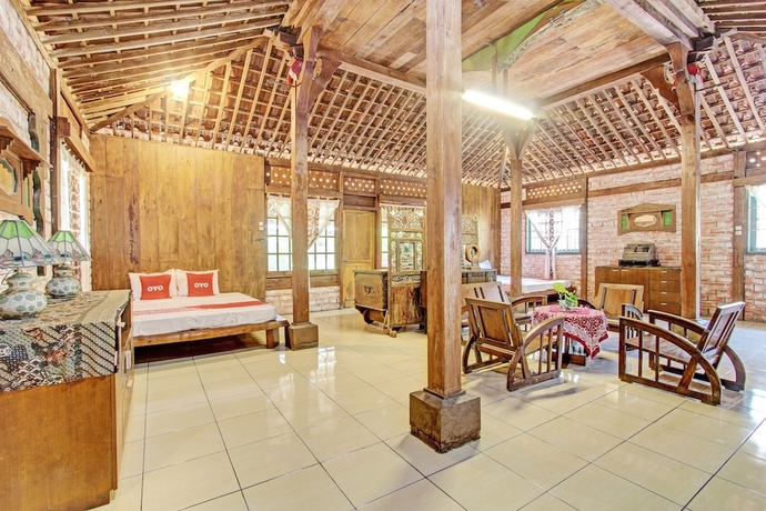 Imagen de la habitación del Hotel OYO Homes 93598 Omah Baturan Syariah. Foto 16