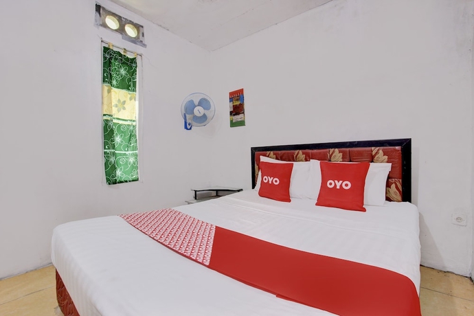 Imagen de la habitación del Hotel OYO Homes 93599 Homestay Bambu Oerip. Foto 3