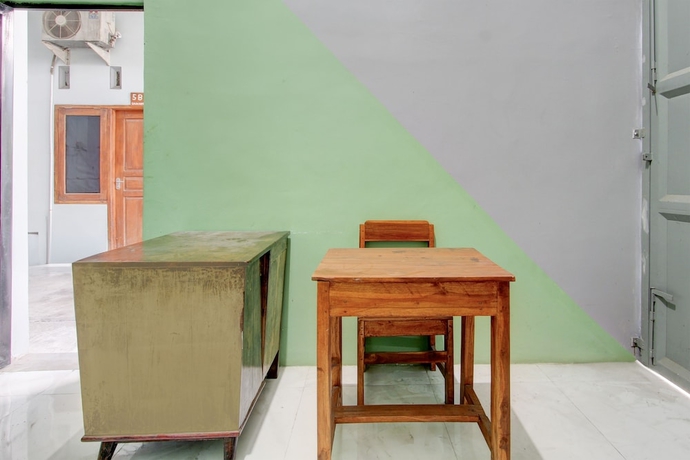 Imagen de los interiores del Hotel OYO Homes 93599 Homestay Bambu Oerip. Foto 18