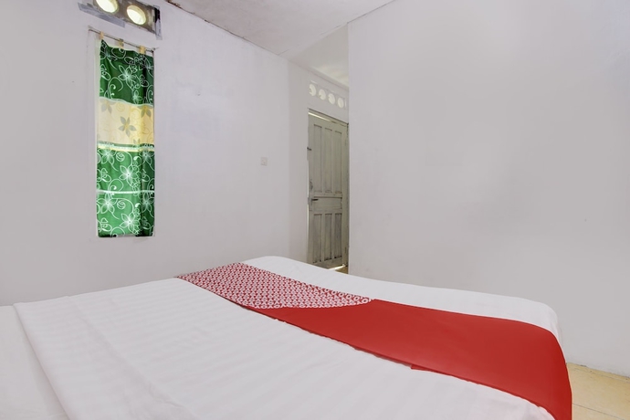 Imagen de la habitación del Hotel OYO Homes 93599 Homestay Bambu Oerip. Foto 4