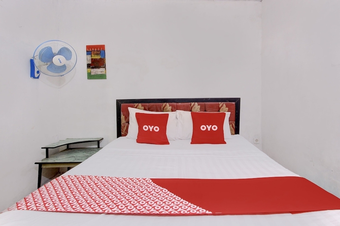 Imagen de la habitación del Hotel OYO Homes 93599 Homestay Bambu Oerip. Foto 8