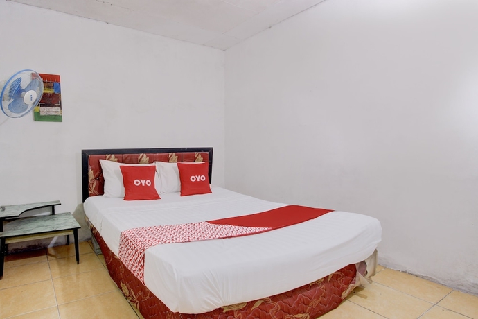 Imagen de la habitación del Hotel OYO Homes 93599 Homestay Bambu Oerip. Foto 9