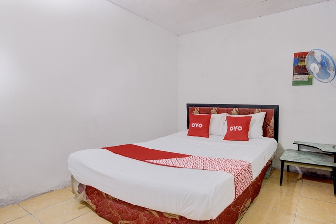 Imagen de la habitación del Hotel OYO Homes 93599 Homestay Bambu Oerip. Foto 12