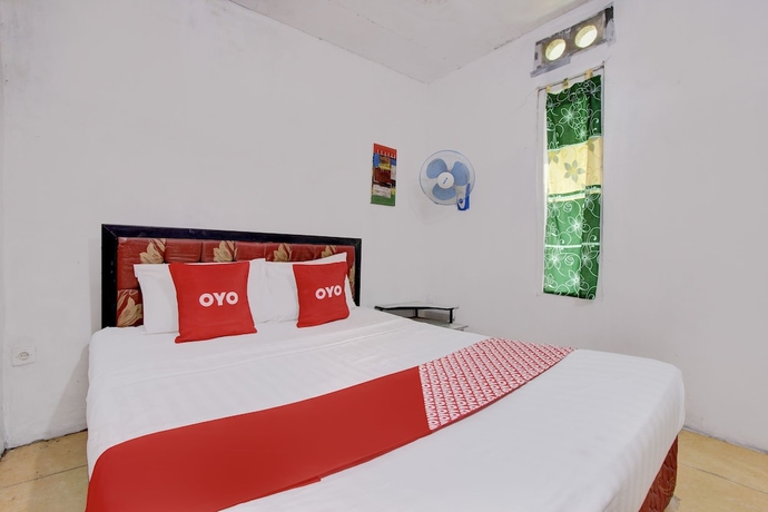 Imagen de la habitación del Hotel OYO Homes 93599 Homestay Bambu Oerip. Foto 13