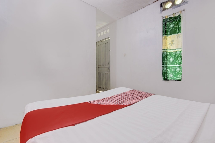 Imagen de la habitación del Hotel OYO Homes 93599 Homestay Bambu Oerip. Foto 14