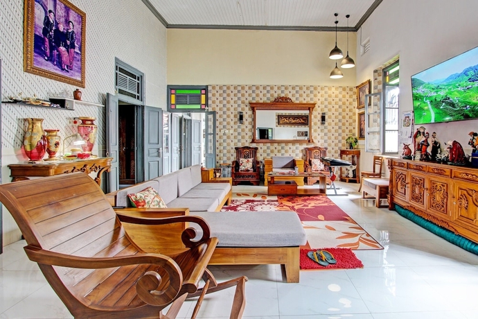 Imagen de los interiores del Hotel OYO Homes 93608 Yy\'s House Syariah. Foto 16