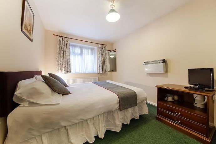 Imagen de la habitación del Hotel OYO Honeycroft Lodge. Foto 3