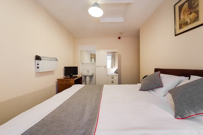 Imagen de la habitación del Hotel OYO Honeycroft Lodge. Foto 5