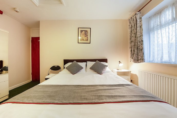 Imagen de la habitación del Hotel OYO Honeycroft Lodge. Foto 7