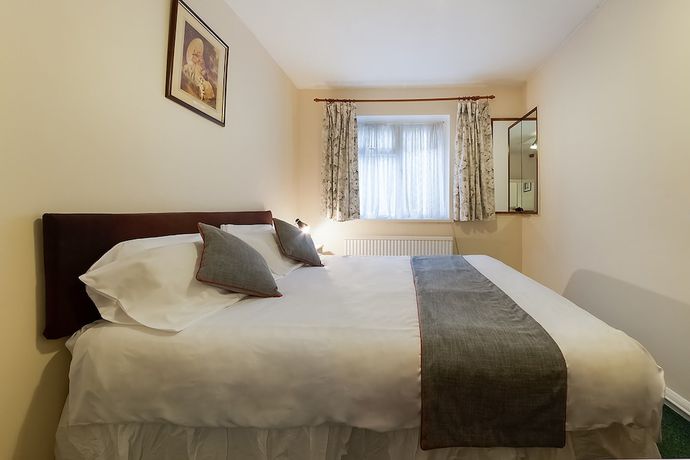 Imagen de la habitación del Hotel OYO Honeycroft Lodge. Foto 12