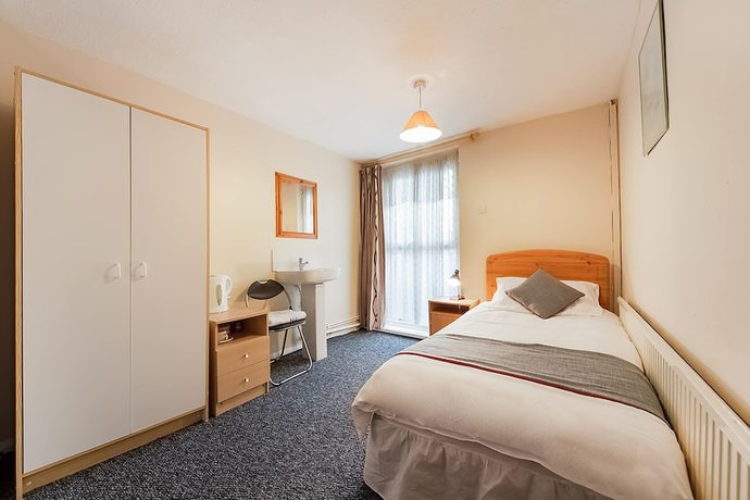 Imagen de la habitación del Hotel OYO Honeycroft Lodge. Foto 13