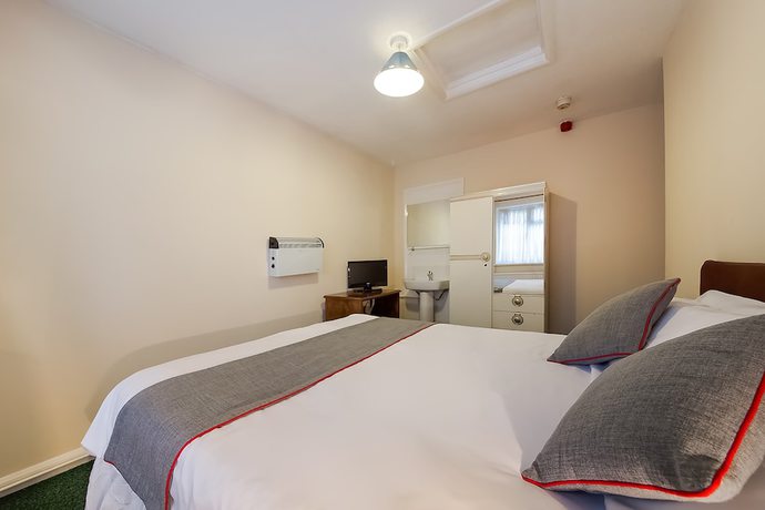 Imagen de la habitación del Hotel OYO Honeycroft Lodge. Foto 15