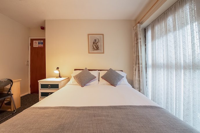 Imagen de la habitación del Hotel OYO Honeycroft Lodge. Foto 17