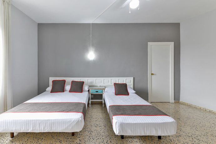 Imagen de la habitación del Hotel OYO Hostal El Pilar. Foto 2