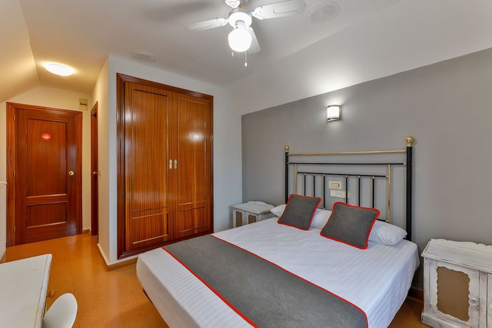 Imagen de la habitación del Hotel OYO Hostal El Pilar. Foto 9