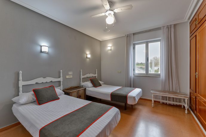 Imagen de la habitación del Hotel OYO Hostal El Pilar. Foto 11