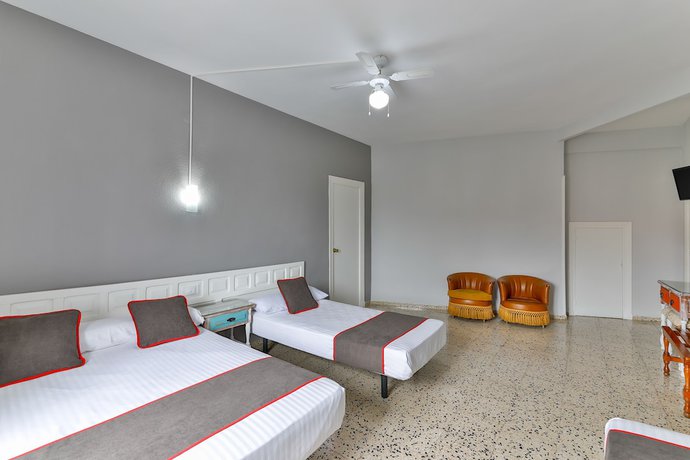 Imagen de la habitación del Hotel OYO Hostal El Pilar. Foto 14