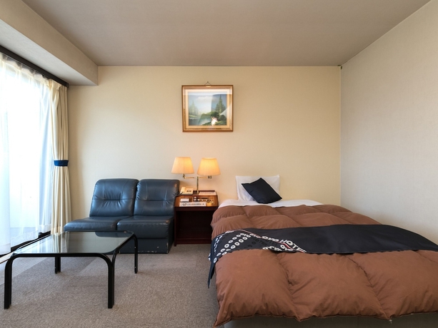 Imagen de la habitación del Hotel OYO Hotel Paramount in Urasa. Foto 4