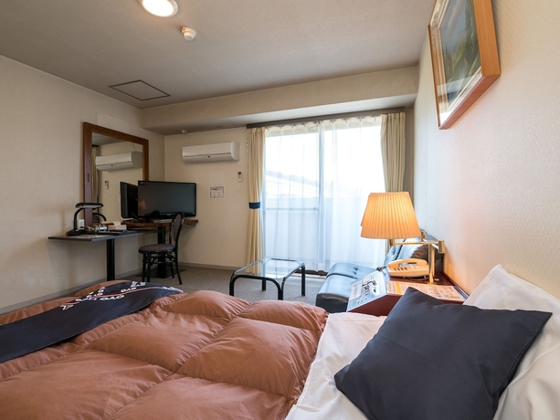 Imagen de la habitación del Hotel OYO Hotel Paramount in Urasa. Foto 5