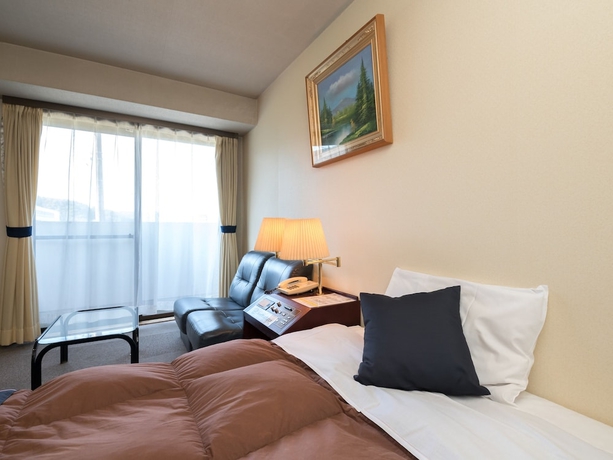 Imagen de la habitación del Hotel OYO Hotel Paramount in Urasa. Foto 6
