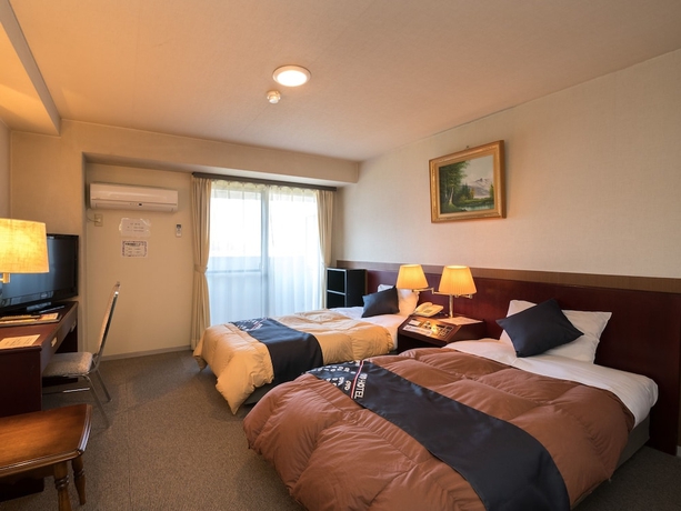 Imagen de la habitación del Hotel OYO Hotel Paramount in Urasa. Foto 9