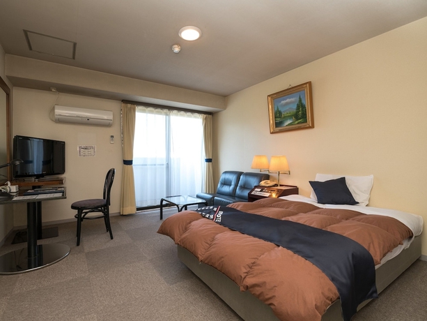 Imagen de la habitación del Hotel OYO Hotel Paramount in Urasa. Foto 11