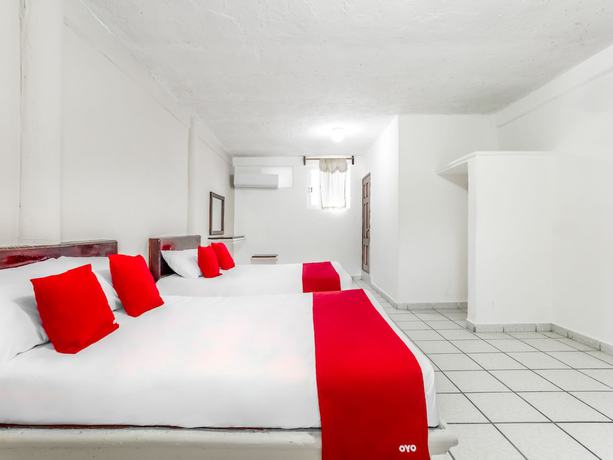 Imagen de la habitación del Hotel OYO Jaguar. Foto 3