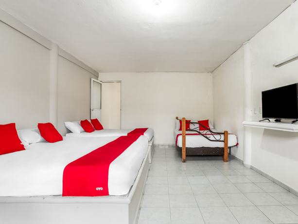 Imagen de la habitación del Hotel OYO Jaguar. Foto 9