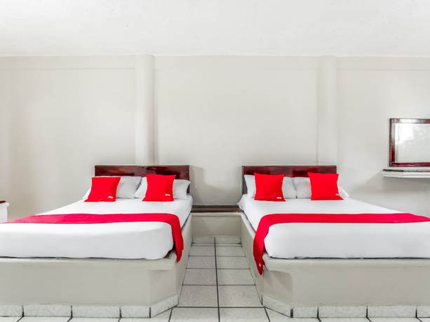 Imagen de la habitación del Hotel OYO Jaguar. Foto 12