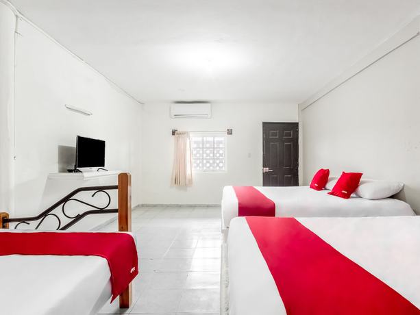 Imagen de la habitación del Hotel OYO Jaguar. Foto 13