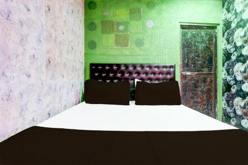 Imagen de la habitación del Hotel OYO Jannat. Foto 20