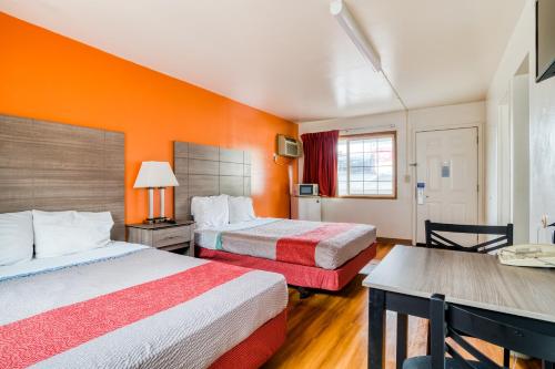 Imagen de la habitación del Hotel OYO Kalama. Foto 5
