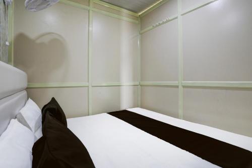 Imagen de la habitación del Hotel OYO Krishna Rooms. Foto 19