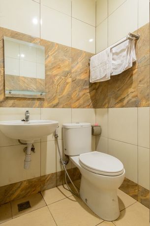 Imagen de la habitación del Hotel OYO LIfe 93129 Kost Mangga. Foto 6