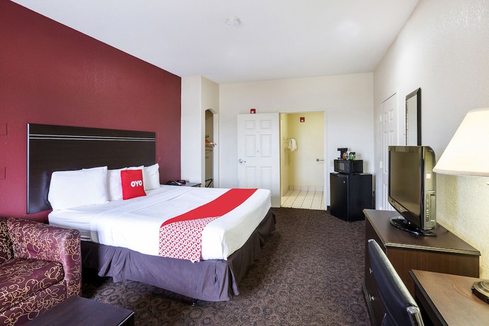 Imagen de la habitación del Hotel OYO LSU. Foto 2