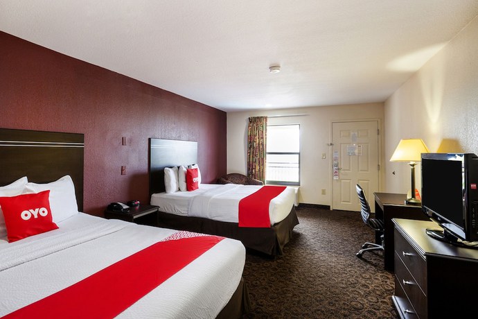 Imagen de la habitación del Hotel OYO LSU. Foto 4