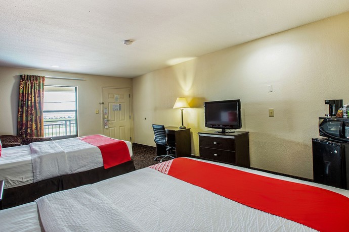 Imagen de la habitación del Hotel OYO LSU. Foto 8