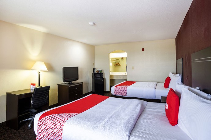 Imagen de la habitación del Hotel OYO LSU. Foto 9