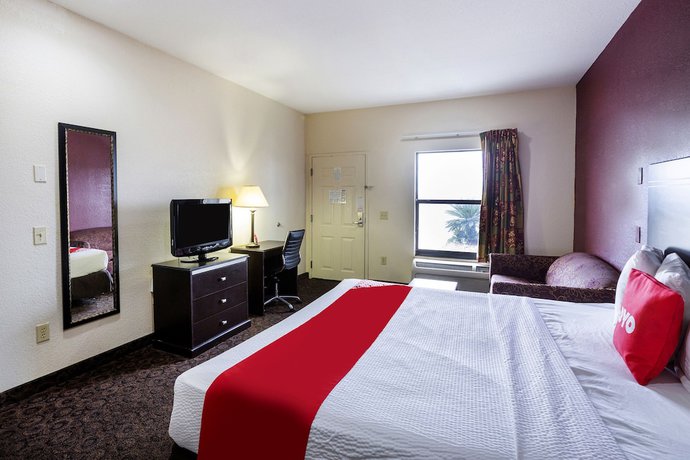 Imagen de la habitación del Hotel OYO LSU. Foto 11
