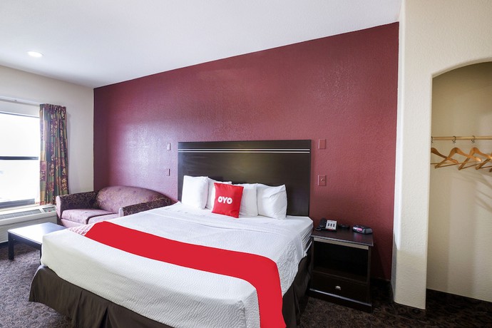 Imagen de la habitación del Hotel OYO LSU. Foto 12