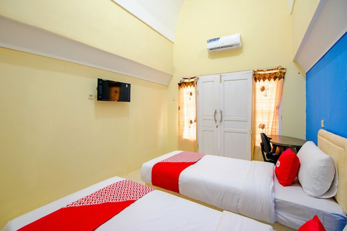 Imagen de la habitación del Hotel OYO Life 1643 Grand Monica. Foto 10