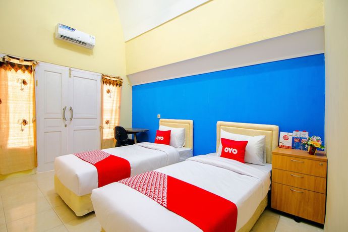 Imagen de la habitación del Hotel OYO Life 1643 Grand Monica. Foto 12