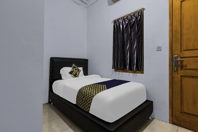 Imagen de la habitación del Hotel OYO Life 2412 Mandala Residence. Foto 4
