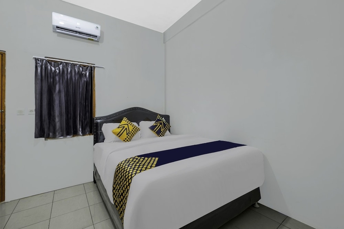 Imagen de la habitación del Hotel OYO Life 2412 Mandala Residence. Foto 9